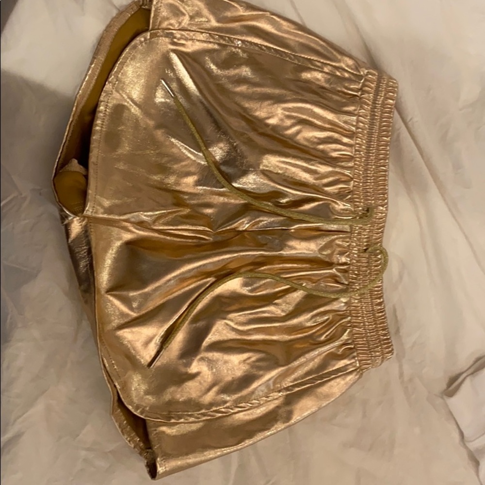 Rose gold metallic shorts BY THE WAY.